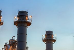 Gas turbine electrical power plant at dusk with twilight